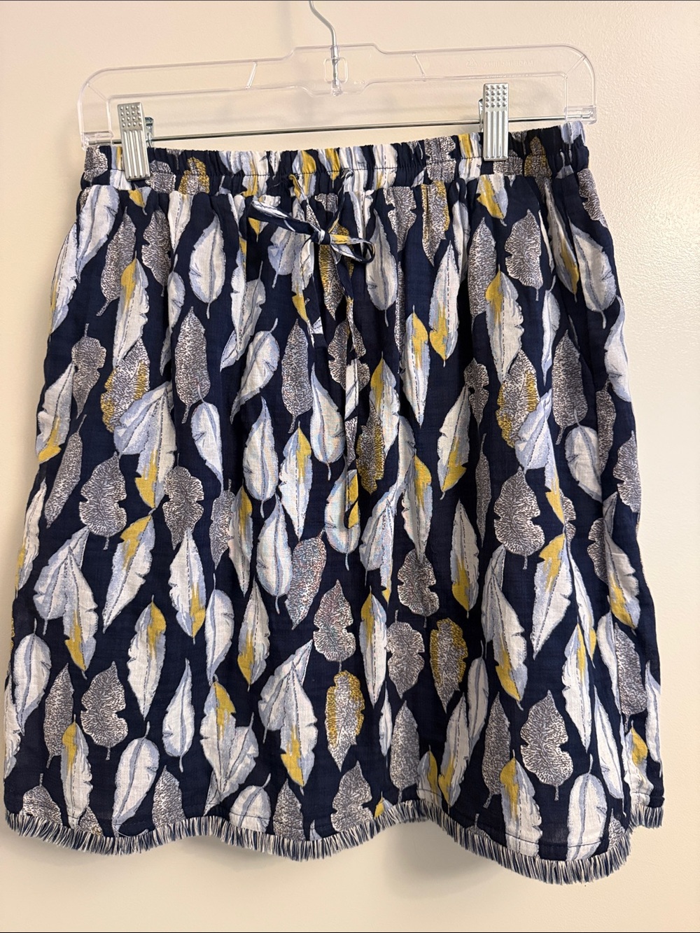 Skies Are Blue Navy Mini Skirt with Yellow and White Leaf Motif